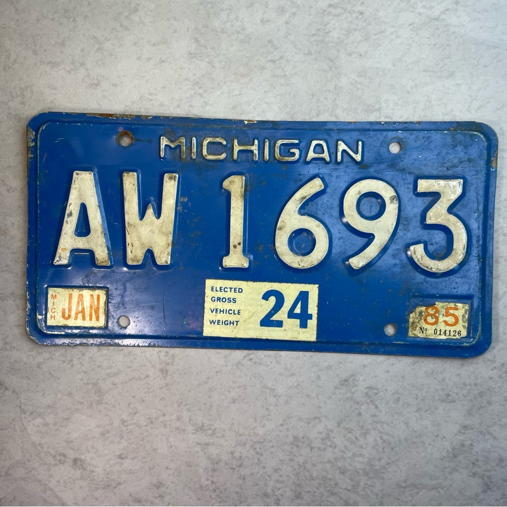 Michigan License Plate AW 1693 Blue White with 1985 Stickers Gross Weight 24
